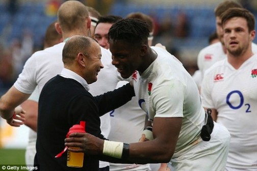 Itoje is congratulated by Eddie Jones, the head coach of England, following his debut cap during the team's 40-9 victory during the Six Nations match against Italy at the Stadio Olimpico in Rome on February 14