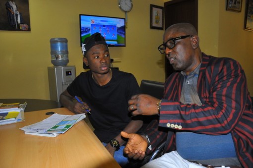 Lil Kesh (left) with Mr Adeyinka Adeboye, Senior Special   Assistant on Sports to Lagos State Governor