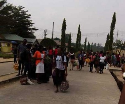 Niger Delta University students waiting for vehicles to convey them from the school premises