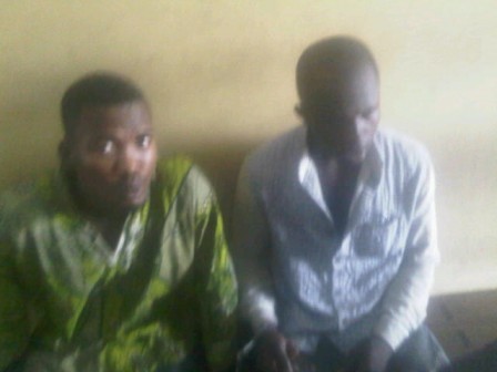 Night guards, Ugo Onuora (left) and Bright Anaenyewu at court