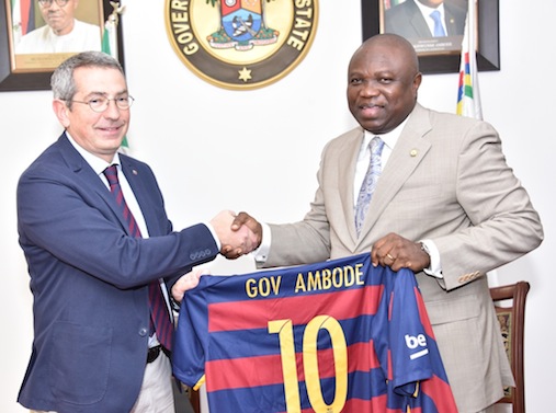 UNVEILED: Lagos State Governor, Mr. Akinwunmi Ambode (right), being presented with a jersey of FC Barcelona of Spain by the Board member of the Club, Pau Vilanova i Vila Abadal, during a courtesy visit to the Governor, at the Lagos House, Ikeja, on Monday, February 22, 2016