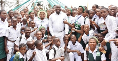 L-R: Lagos State Governor, Mr. Akinwunmi Ambode (middle), in a group photograph with students of Federal Government College (FGC), Warri in Delta State during one of the programmes lined up for the 50th Anniversary of the School, on Saturday, February 27, 2016
