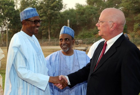 PRESIDENT BUHARI HOST DIPLOMATIC CORPS. President Muhammadu Buhari exchanging greetings  with US Ambassaador to Nigeria, Mr James F. Entwistle. With him is the Dean of Diplomatic Corp and High Commissioner to Nigeria, Mr  Salaheddine Abbas Ibrahima during a reception at the State House in Abuja. PHOTO; SUNDAY AGHAEZE/STATE. FEB 18 2016.