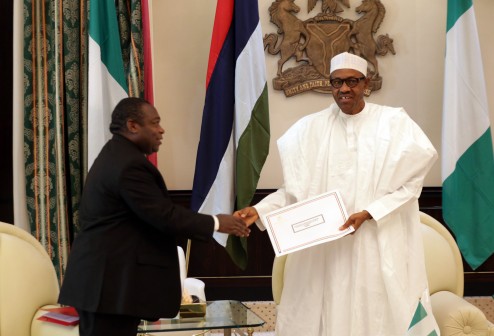  President Muhammadu Buhari being presented with a letter from the President of Equatorial Guinea by the Special Envoy of the Equatorial Guinea, Mr, Juan A.B. Nchuchuma during a courtesy visit by the Special Envoy to the Presidential Villa Abuja. PHOTO; SUNDAY AGHAEZE/STATE HOUSE. FEB 12 2016.