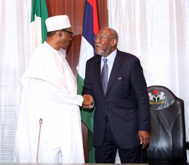 PRESIDENT BUHARI RECEIVES USIP TEAM. L-R;  President Muhammadu Buhari and Senior Advisor Economic Office, United States Institute of Peace (USIP), Mr Johnnie Carson exchange greetings during an audience with USIP  at the State House in Abuja. PHOTO; SUNDAY AGHAEZE/STATE HOUSE. FEB 15 2016.