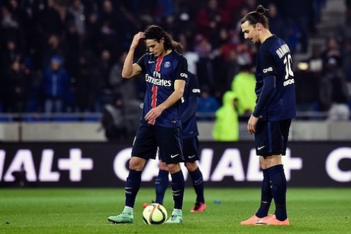 Downcast: Edison Cavani (L) and Zlatan Ibrahimovic are dejected after the loss