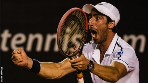 Pablo Cuevas celebrates after beating Rafael Nadal