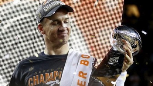 Peyton Manning of Denver Broncos poses with the title