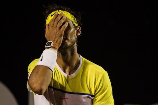 Rafael Nadal reacts to his latest setback
