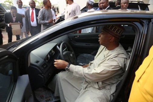 FILE PHOTO: Senator Bukola Saraki checking out an Innoson motors car