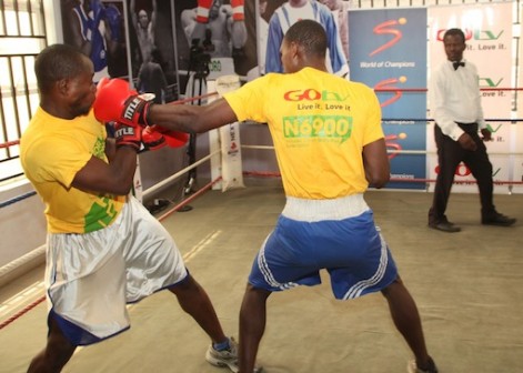Two young amateur boxers during a sparring session at the GOtv Boxing NextGen Search at the Lagos Boxing Hall of Fame gym in Surulere