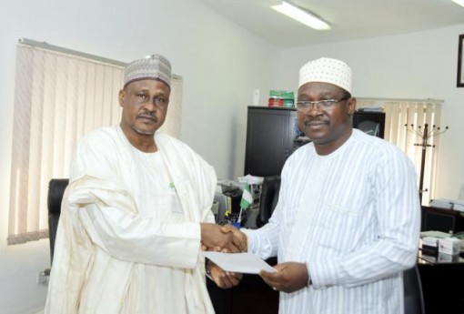 Ahmed Abdu (L) takes over from Babatunde Kuye as Acting Director-General, Bureau of Public Procurement (BPP)