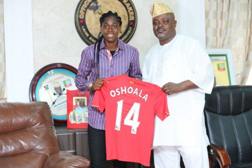 L-R: Super Falcons and Liverpool Ladies star, Azeezat Oshoala presenting her jersey to the Speaker of the Lagos State House of Assembly, Rt. Hon. Mudashiru Obasa when she visited the Speaker in his office on Tuesday.