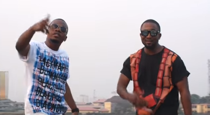 Darey & Olamide in the video