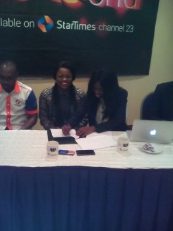 Nollywood star actress, Funke Akindele (left) signing the partnership deal with irokoWorld TV in Lagos Wednesday, while Head Legal and Distribution, Iroko TV, Uloma Onuma looks on 