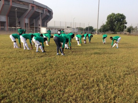 Chief Coach of Nigeria's Super Eagles, Samson Siasia drills the home-based players in a training session at the Abuja National Stadium on Wednesday. 