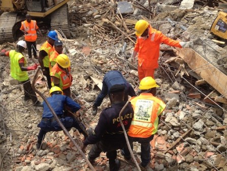 Rescue operatives carefully pulling out a victim PHOTO: PM News