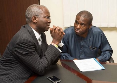 Louis Edozien (R) with the Minister of Power, Babatunde Fashola