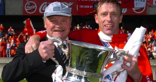 Ronnie McFall celebrates winning the 2005 Irish Cup with Portadown striker Vinny Arkins Photo: BBC