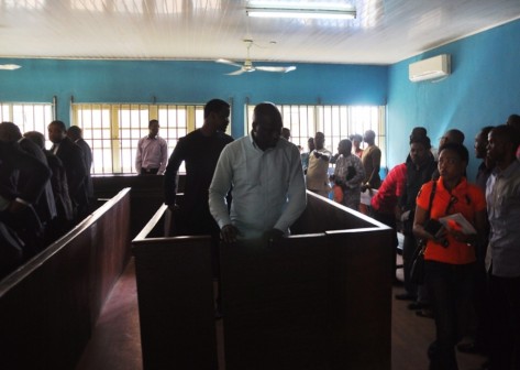 Managing Director Of Lekki Gardens, Richard Nyong and the Contractor, Taiwo Odofin in the dock at the Ebute Metta Chief Magistrate Court, Lagos, on Friday, March 11, 2016. 