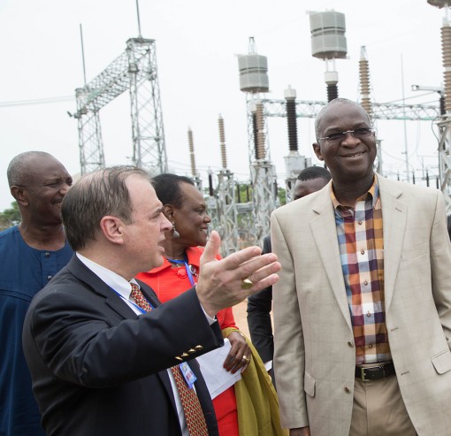 Babatunde Fashola (right), being welcomed by the Managing Director of Enugu Electricity Distribution Company, Mr Robert Dickerman to the Third Monthly Meeting of the Minister with Sectoral Participants in the Power Sector at the Ugwuaji Transmission Station, Enugu