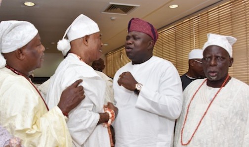 L-R: Lagos State Governor, Mr. Akinwunmi Ambode (2nd right), discussing with White Cap Chiefs -  Egbe of Lagos, Chief Abayomi Olusi; Obanikoro of Lagos, Chief Ajayi Bembe and Ologun Agun of Lagos, Chief Raufu Salam during a courtesy visit by the Council of Obas and Chiefs in the State , at the Lagos House, Ikeja on Thursday, March 10, 2016.