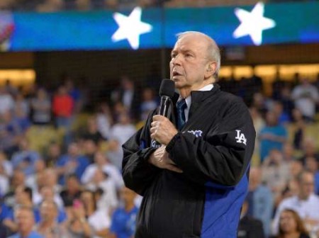  In this Sept. 18, 2015, file photo, Frank Sinatra, Jr. sings the national anthem prior to a baseball game between the Los Angeles Dodgers and the Pittsburgh Pirates in Los Angeles. © AP Photo/Mark J. Terrill