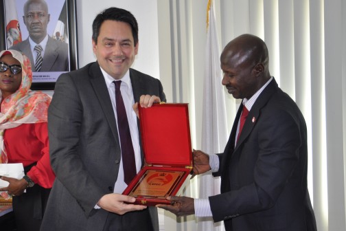 Leader of the delegation, Stephen Tuigg MP exchanging a gift with Ibrahim Magu, EFCC boss