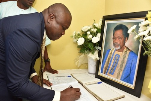 Lagos State Governor, Akinwunmi Ambode signing the condolence register at Dr. Tunji Braithwaite's house in Victoria Island, Lagos