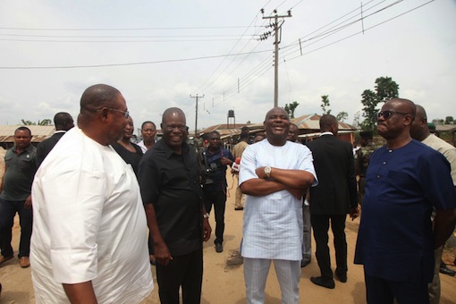 Rivers State Governor, Nyesom Wike (Second Right), Mr Ephraim Nwuzi, Rivers State Commissioner  for Employment,(3rd r) Prince Emma Anyanwu,  PDP Chieftain, Etche Local Government Area and Chief Jerome Eke, PDP House of Representatives Candidate for Etche/Omuma Federal Constituency after the governor inspected ongoing work on Igwuruta-Chokocho-Etche road on Tuesday