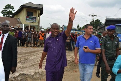 Wike acknowledging the cheers of the people of Etche LGA after inspecting Etche-Chokocho  road on Wednesday