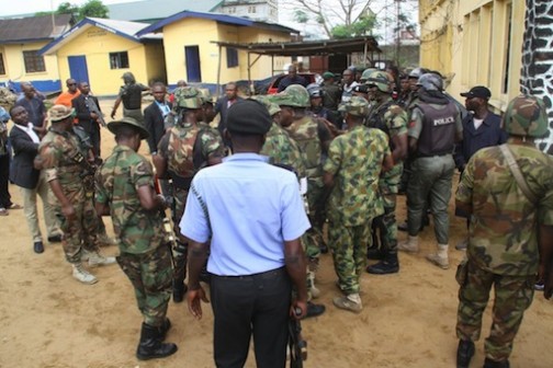 Soldiers at Mile One police station