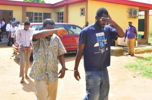 The two alleged fraudsters - Rilwanu Jamiu and Balogun Stanley Oyewole, arraigned by the Department of State Security (DSS) for cloning the mobile number of the Lagos State Governor, Mr. Akinwunmi Ambode at the Isolo Chief Magistrate Court on Wednesday, April 20, 2016