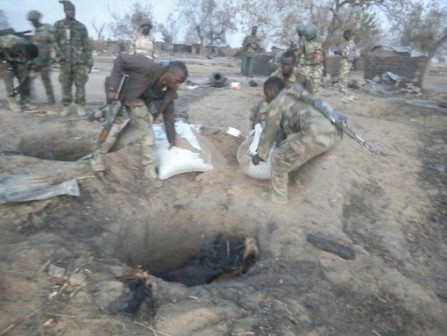 Nigerian troops dig out food stored underground  by Boko Haram