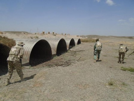 Nigerian troops survey a Boko Haram sight