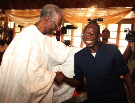 Governor Adams Oshiomhole (right) and Chief Tony Anenih at the St Anthony's Catholic Church, Uromi where the Governor bagged an award for his service to the Church, on Sunday