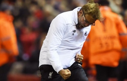 Jurgen Klopp pump fists after a Liverpool goal
