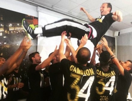 Coach Massimiliano Allegri gets victory treatment from his players