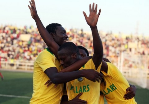 Players of Kano Pillars celebrating after scoring a goal