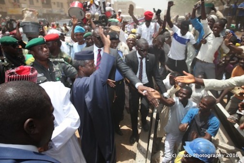 Prof Yemi Osinbajo acknowledging the cheers of the rapturous citizens of Kano