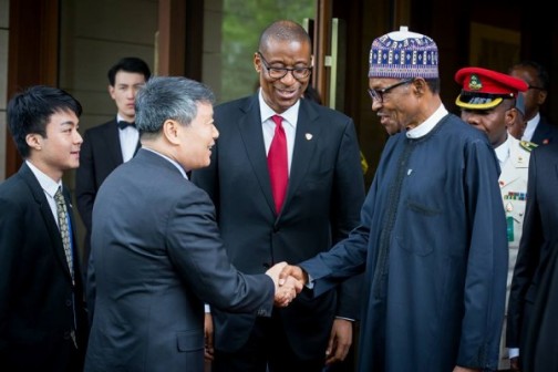FILE PHOTO: President Buhari being welcomed by Mr Xu Shaoshi Chairman of National Reform and Development Commission. With them is Minister of Industry, Trade & Investment Okechukwu Enemalah