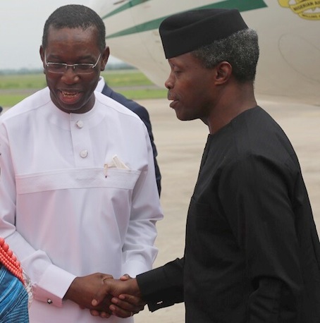 Delta State Governor, Senator Ifeanyi Okowa (left) receives Vice President, Prof. Yemi Osibanjo at Osubi Airport in Warri, Delta State.
