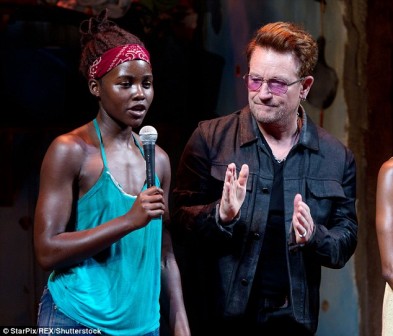 Bono and Lupita Nyong'o addressing the audience