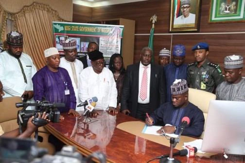 Governor Bello signs the budget