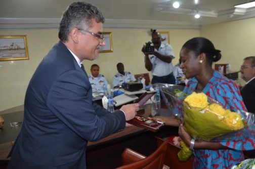 Czech Republic Deputy Minister of  Defence, Tomas Kuchta, presenting a memento to Dr (Mrs) Hedima as part of  the schorlarship award