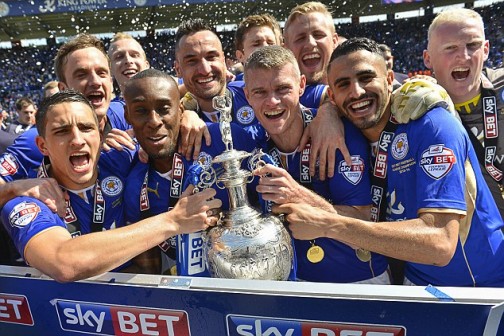 Leicester players celebrate winning the First Division title