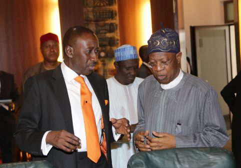 L-R; National Security Adviser to the Major General Babagana Monguno chats with the Minister of Information, Alhaji Lai Mohammed