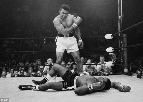 Muhammad Ali is pictured above standing over fallen challenger Sonny Liston on May 25, 1965 in Lewiston, Maine. This image of the Heavyweight Champion became iconic and is recognized around the world 