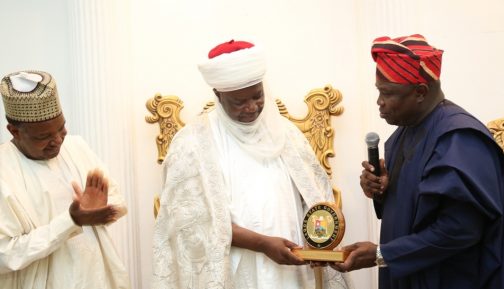 R-L: Lagos State Governor, Mr. Akinwunmi Ambode, presenting the Lagos State plaque to the Emir of Argungu, Alhaji Samaila Muhammed Mera while Governor of Kebbi State, Alhaji Atiku Bagudu, watches during Governor Ambode’s courtesy visit to the Emir’s Palace in Kebbi State on Saturday, June 4, 2016.