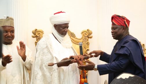 R-L: Lagos State Governor, Mr. Akinwunmi Ambode, receiving a gift from the Emir of Argungu, Alhaji Samaila Muhammed Mera during his visit to the Emir’s Palace in Kebbi State on Saturday, June 4, 2016. With them is Governor of Kebbi State, Alhaji Atiku Bagudu.